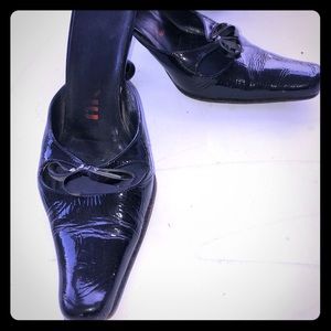 Miu miu patent mules.